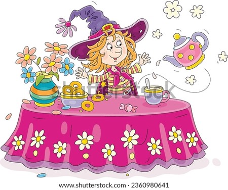 Funny little witch at her festive table with a tea cup, a flying magical teapot, a flower vase and tasty fresh pastry, vector cartoon illustration isolated on a white background