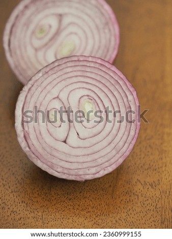 an onion on wooden table. 