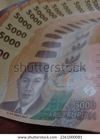 stock photo of 5000 banknote close up