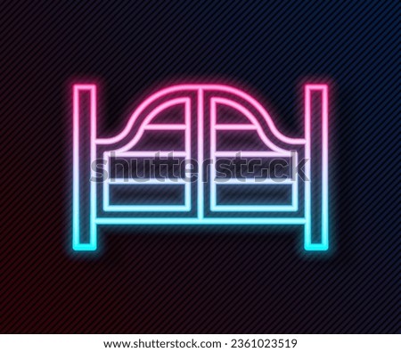 Glowing neon line Old western swinging saloon door icon isolated on black background.  Vector Royalty-Free Stock Photo #2361023519