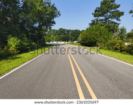 Asphalt concrete pavement road in Bolivia, North Carolina, USA.