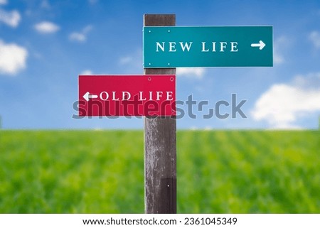 Street Sign the Direction Way to NEW LIFE versus OLD LIFE