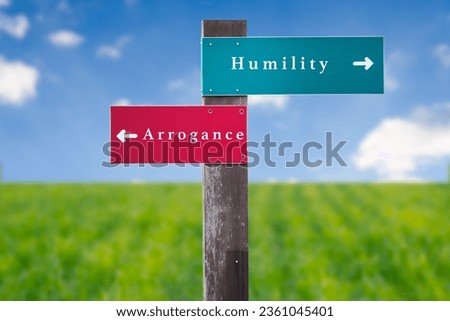 Street Sign the Direction Way to Humility versus Arrogance Royalty-Free Stock Photo #2361045401