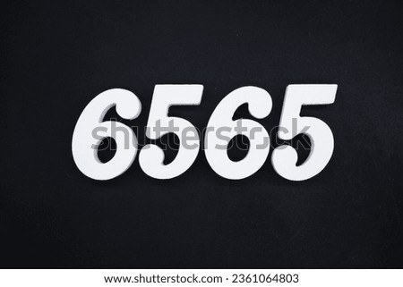 Black for the background. The number 6565 is made of white painted wood.