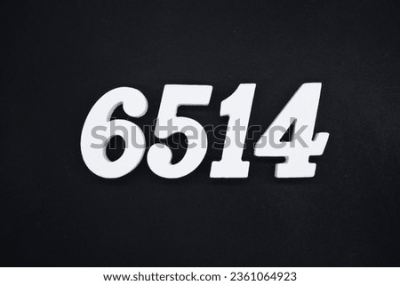 Black for the background. The number 6514 is made of white painted wood.
