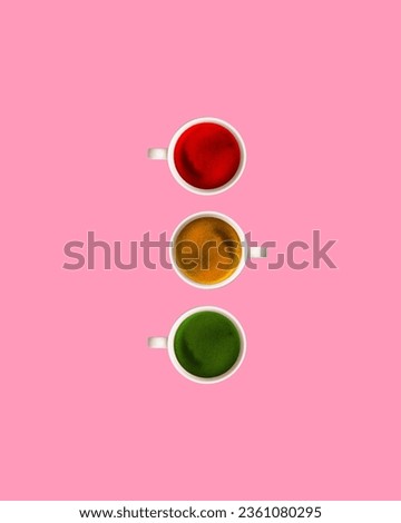 Traffic lights. Time for coffee. Cups with colorful drinks inside isolated on pink background. Concept of popular drink, taste. Minimal design. Copy space for ad. Flyer