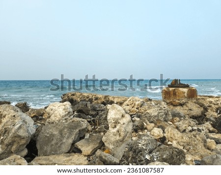 Rocks on the edge of the beach 