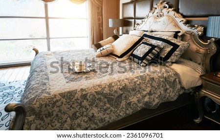 Breakfast on king size bed in luxury hotel room