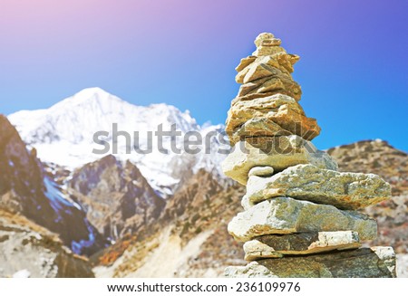 Himalayas mountain landscape with stone tower