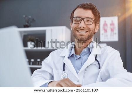 Portrait of happy arabic doctor posing at clinic
