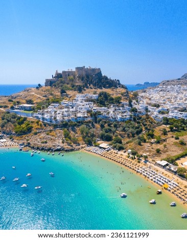 Panoramic view of Lindos village and Acropolis, Rhodes, Greece Royalty-Free Stock Photo #2361121999