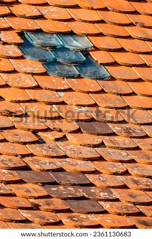 Repairs to historic tiled roof
