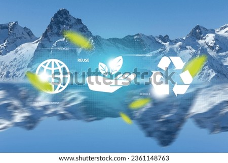 Reduce, reuse, recycle symbol in the middle of blue snowy mountain peaks