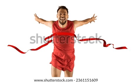 The runner wins by crossing the finish line ribbon on a white background. Sport and fitness motivation Royalty-Free Stock Photo #2361151609