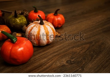 Halloween decorations background. Halloween Scary pumpkin head on wooden table Halloween holiday concept.