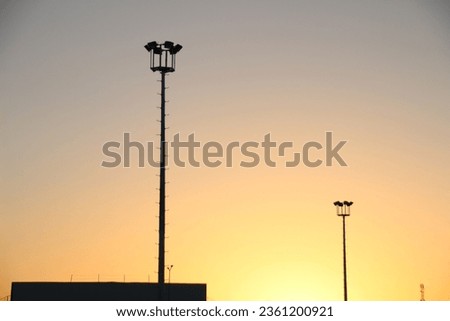 Light tower silhouette at sunset 