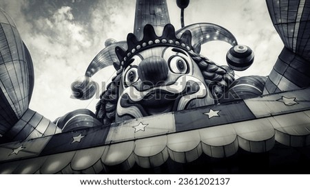 Scary vintage clown themed circus tent in the dark, horror and mystery concept
