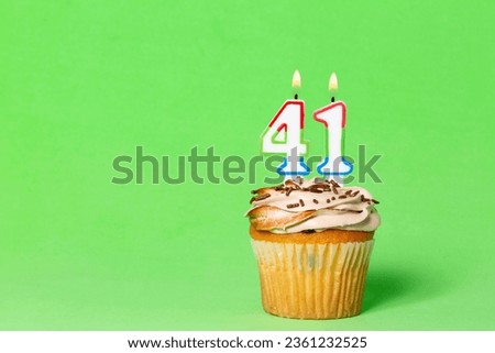 Birthday Card With Cupcake And Number 41 Candle; Photo On Green Background.