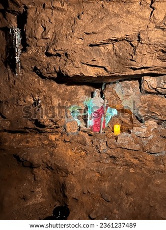 Underground of the historic silver mine in Tarnowskie Gory, a UNESCO heritage site. Figurine of Saint Barbara, patron saint of miners underground. Royalty-Free Stock Photo #2361237489