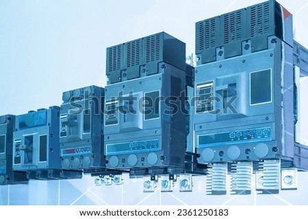 Electrical equipment. Automatic current switch. Electrical control equipment. Circuit breakers of various sizes. Electrical equipment for power shield. Automatic machines for electric cabinet Royalty-Free Stock Photo #2361250183