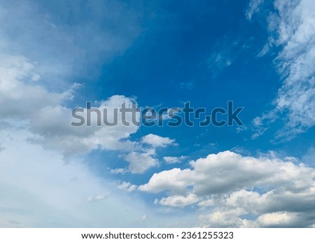 Blue sky and Clouds Cumulus a large group of white filled the sky beautiful at Bangkok, Thailand.no focus
