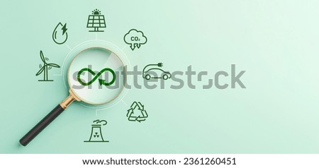 Green energy, New alternative renewable energy technologies for sustainability, Magnifying glass with icon, Reduce carbon dioxide, Greenhouse gases, Windmill, Solar panels, ECO friendly, Save planet Royalty-Free Stock Photo #2361260451