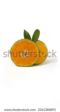 Orange juice and sliced oranges in white background| Minimal flat-lay photography 