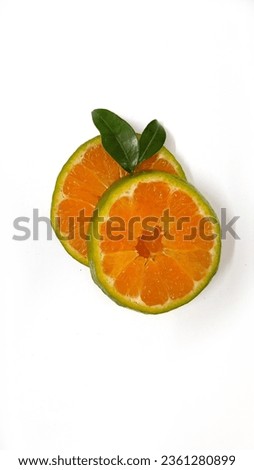 Orange juice and sliced oranges in white background| Minimal flat-lay photography 