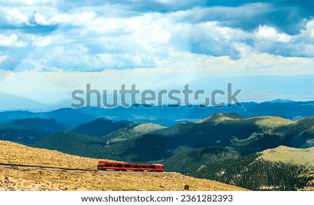 The Broadmoor Manitou and Pikes Peak Cog Railway is a cog railway that climbs one of the most iconic mountains in the United States, Pikes Peak in Colorado Royalty-Free Stock Photo #2361282393