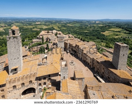 San Gimignano, Italy - June 29 2023: San Gimignano seen from the Torre Grossa. San Gimignano is a small walled medieval hill town in the province of Siena, Tuscany.