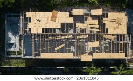 House family construction site. wooden construction of a house. Florida. Above drone Photo.