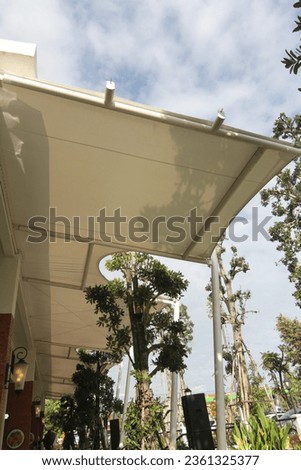 Modern style white canvas awning.
