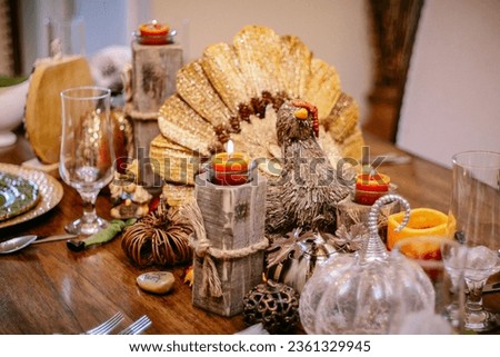 Picture of Thanksgiving decor on a table.
