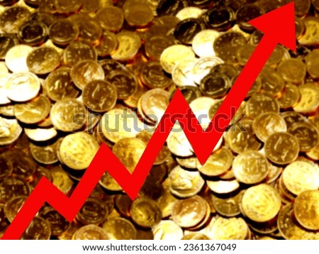 Abstract blurred image of big red arrow pointing upwards on gold coins background. Bar charts and charts. Food prices rise. Inflation concept. retail. finance. stock market. shop.