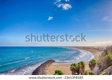 Picturesque View of Playa del Ingles Beach in Maspalomas With Sand Dunes and Palms Trees at Gran Canaria in Spain.Horizontal image Royalty-Free Stock Photo #2361398185