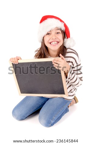 little girl with christmas hat isolated in white background