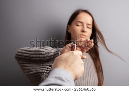 refuse vape smoking, stop electronic cigarette, teenager shows a sign of rejection of disposable ecigarette with her hand Royalty-Free Stock Photo #2361460565