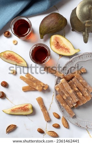 Turkish delight sticks with figs, top view of Turkish tea party