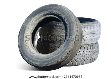 old worn damaged tire isolated on white background as pattern of damaged tire for advertising tire shop or car tire shop