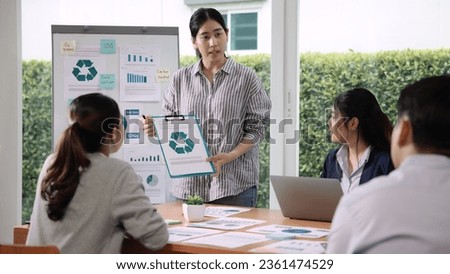 Carbon offset price report CO2 emission. Future growth Net zero waste in ESG ethical SME office protect climate change global warming social issues project. Group of asia people Eco friendly SDGs plan Royalty-Free Stock Photo #2361474529