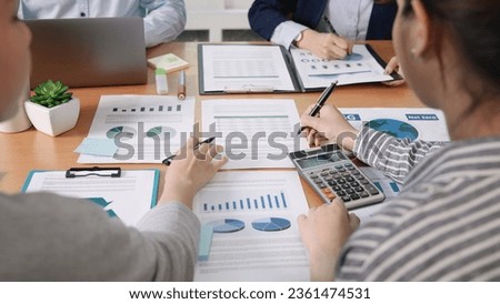 Carbon offset price report CO2 emission. Future growth Net zero waste in ESG ethical SME office protect climate change global warming social issues project. Group of asia people Eco friendly SDGs plan Royalty-Free Stock Photo #2361474531