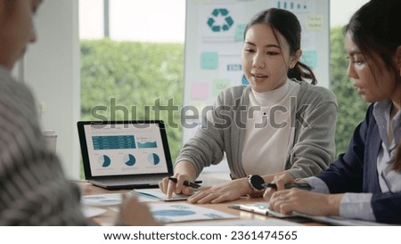 Carbon offset price report CO2 emission. Future growth Net zero waste in ESG ethical SME office protect climate change global warming social issues project. Group of asia people Eco friendly SDGs plan Royalty-Free Stock Photo #2361474565