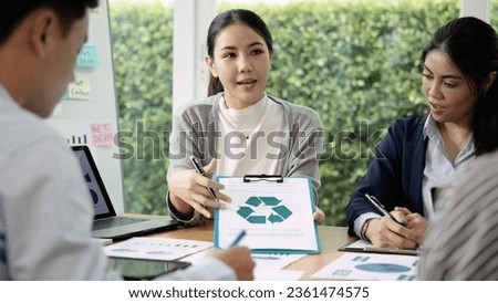 Carbon offset price report CO2 emission. Future growth Net zero waste in ESG ethical SME office protect climate change global warming social issues project. Group of asia people Eco friendly SDGs plan Royalty-Free Stock Photo #2361474575