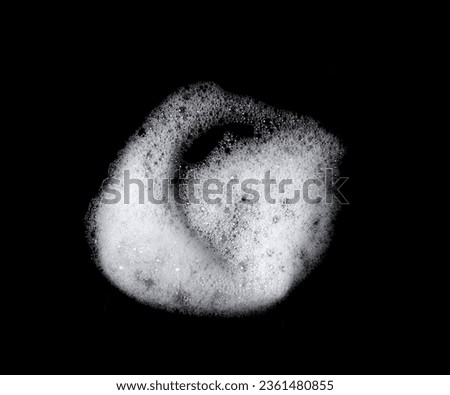liquid white foam from soap or shampoo or shower gel Abstract soap bubbles. Set foam, soap bubble isolated on black, with clipping path texture and background.	
 Royalty-Free Stock Photo #2361480855