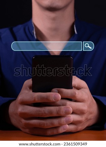 Vertical photo of a Man typing in a search engine, surfing the Internet and looking for information. Search engine optimization.