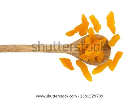 slices of dried apricots in wooden spoon isolated on white background with clipping path, top view, flat lay, concept of healthy breakfast Royalty-Free Stock Photo #2361529739