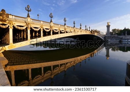 Alexandre III bridge in the 8th arrondissement of Paris city Royalty-Free Stock Photo #2361530717