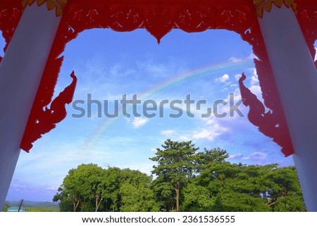 Rainbow appeared in the window.  After the rain has stopped  So we saw a beautiful picture of the colors of the rainbow.