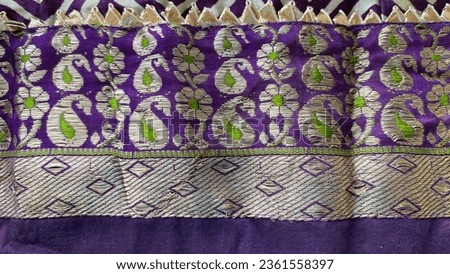 Antique golden paisley with green silk filler brocade border on purple silk fabric