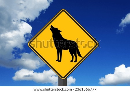 Wolf Sign with Cloudy Bleu sky in Background